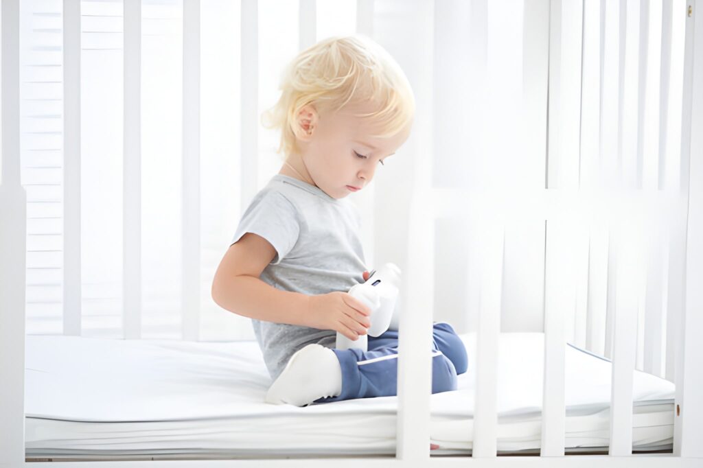 Kolcraft Pediatric 800 Crib and Toddler Mattress