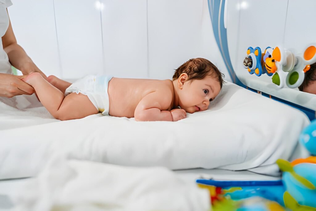 A Newborn Can See Objects Best at a Distance of Exploring Infant Visual Evolution