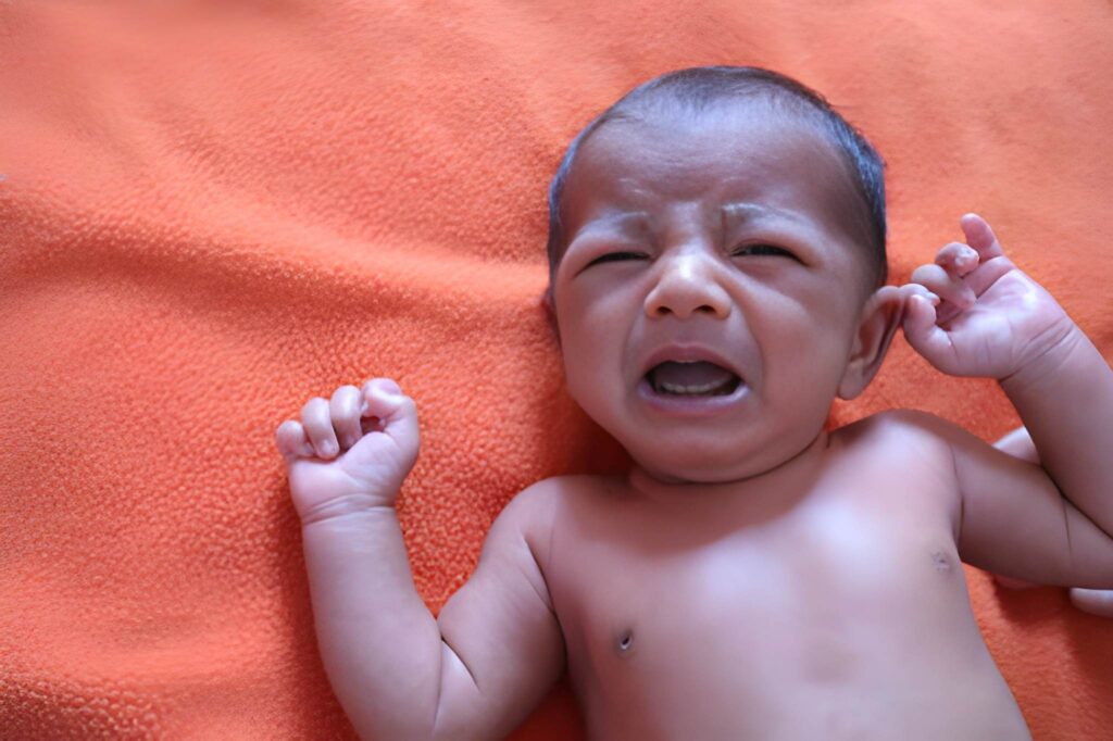 Neurological Nuances Sneezing and the Shrill Cry in Newborns